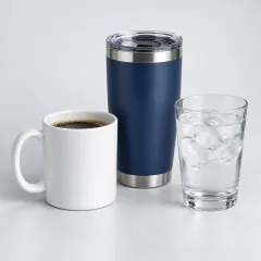 White ceramic mug, navy tumbler and clear drinking glass